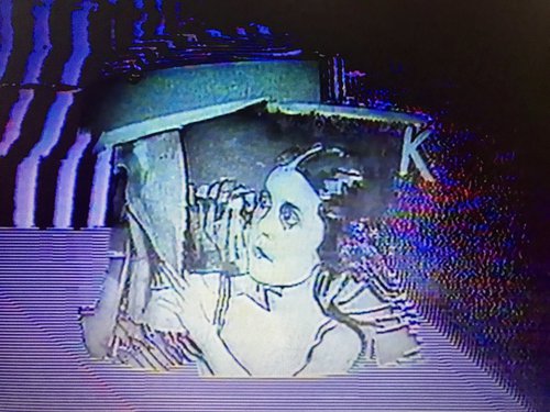 a screenshot from video artist Gianni Toti's Incatenata alla pellicola [Enchained to Film], 1983.